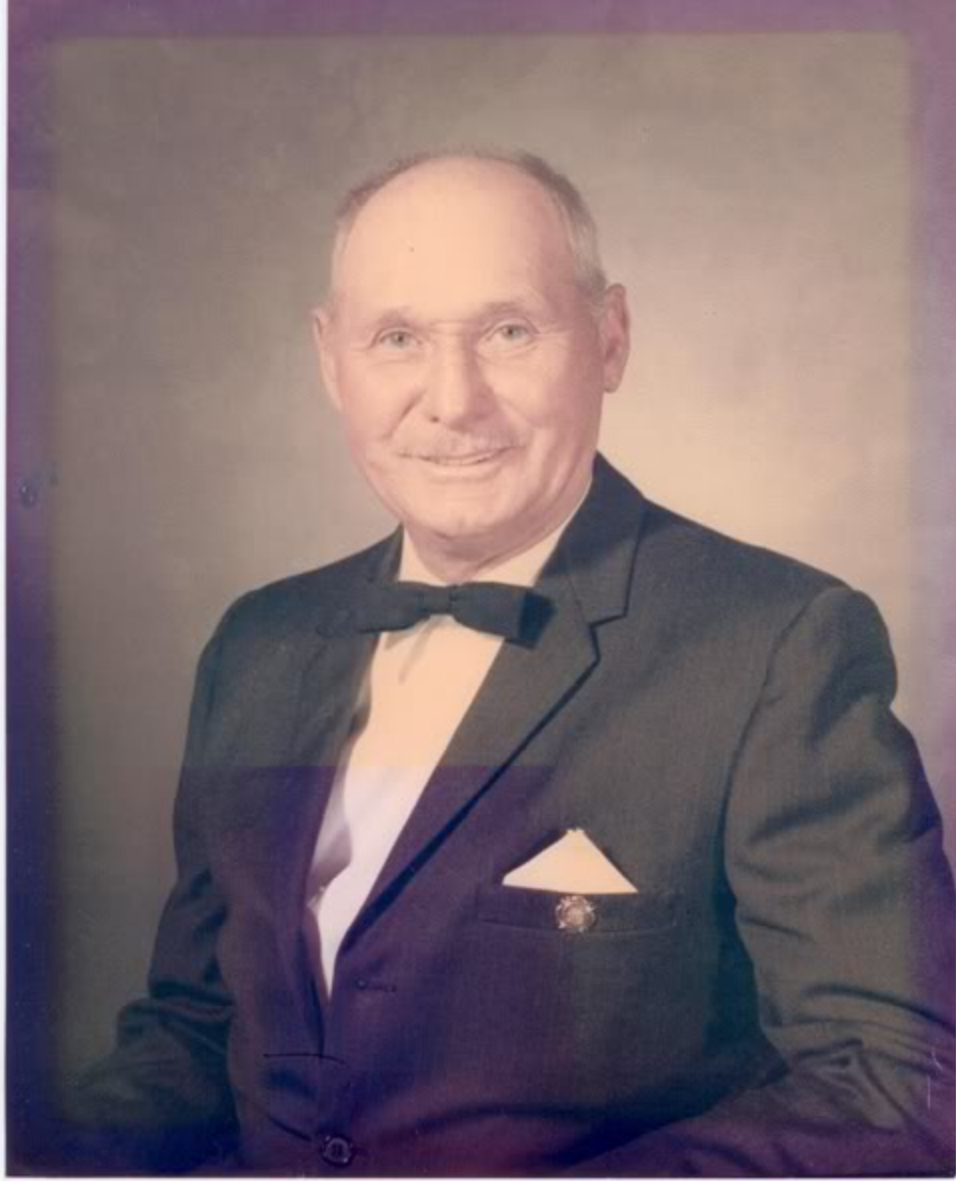 Vintage studio portrait of William Edwin Eddie Andes, founding Fire Chief of the Remington Volunteer Fire Department.